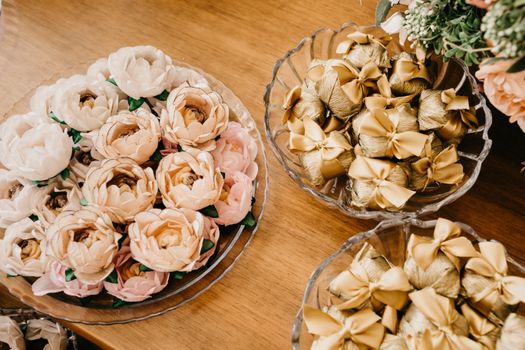 Sweets and decorative fabric gift bags during festive event