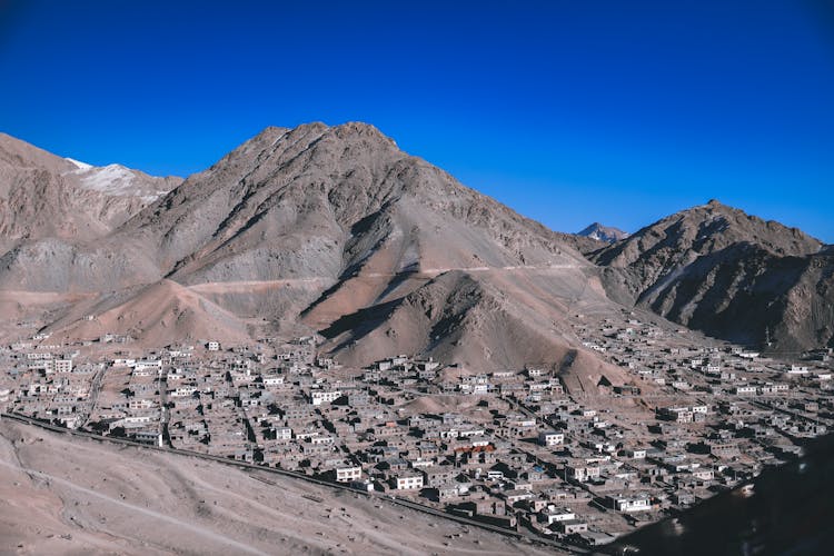 Mountain And A Village In A Valley 