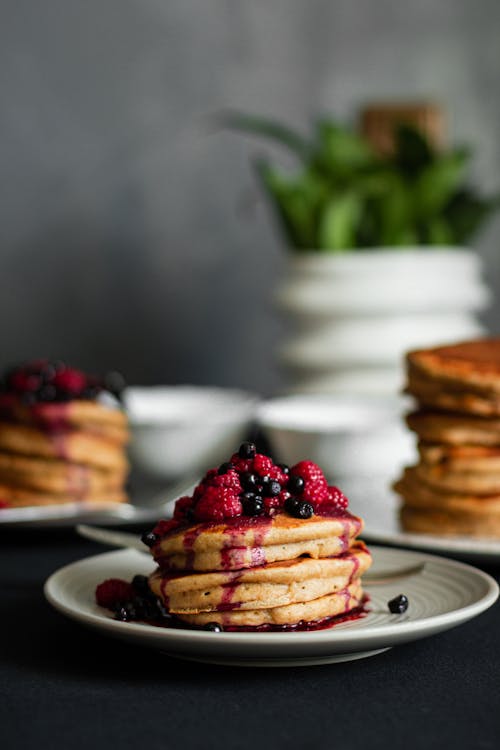 Free Plate with pancakes topped with berry jam Stock Photo