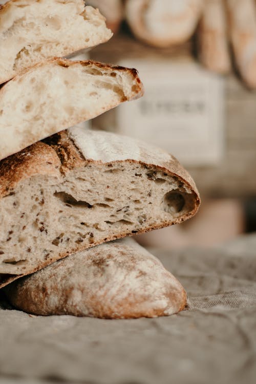 Free Cut fresh homemade bread on cloth Stock Photo