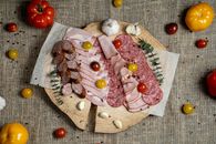 Ham and Tomato on Brown Wooden Round Plate