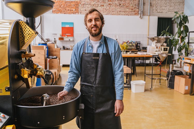 A Man Roasting Coffee Beans