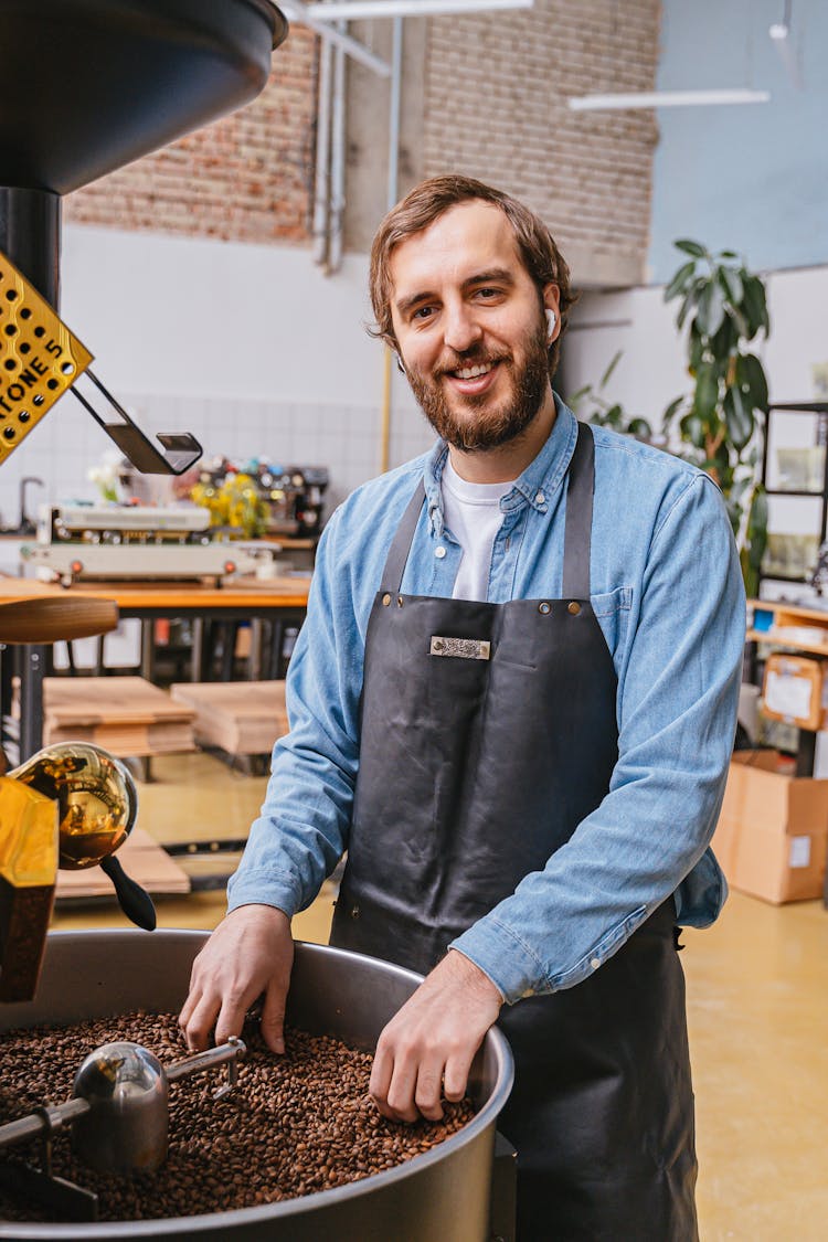 A Man Roasting Coffee Beans