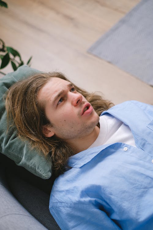 Free Man lying on sofa during psychotherapy therapy Stock Photo