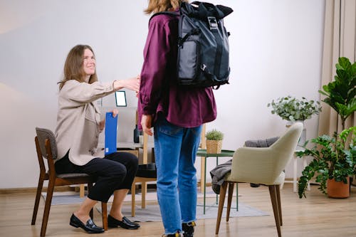 A Woman Greeting Her Patient