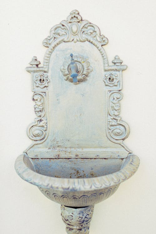 Free A Drinking Fountain on a Wall Stock Photo