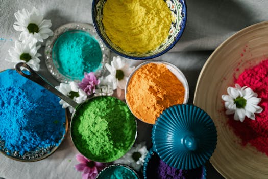 Vibrant Holi powder displayed in bowls, capturing the essence of festival colors and joy.