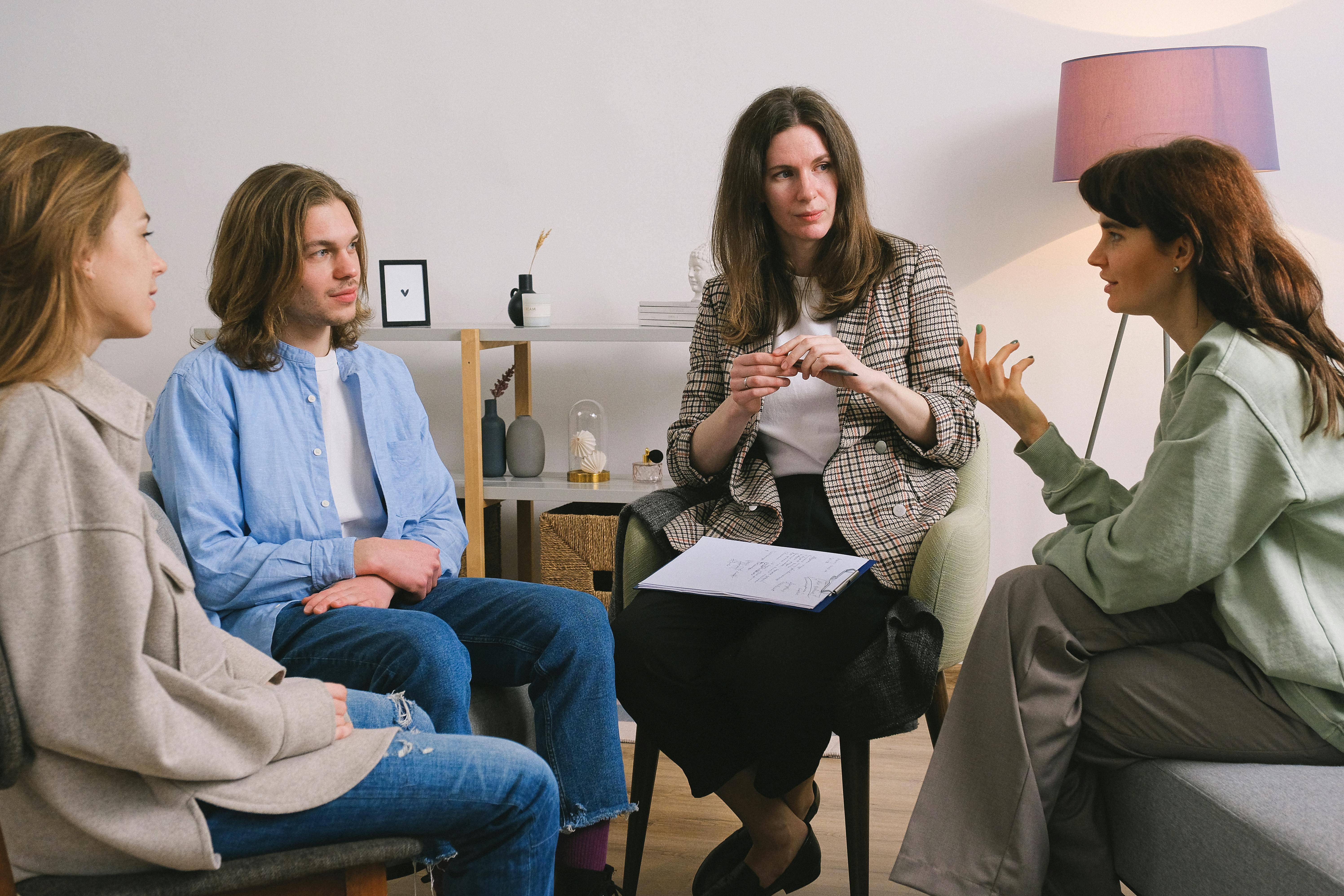 woman discussing problem during group therapy