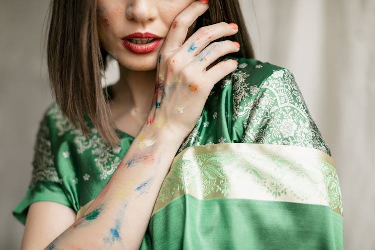 A Woman With Paint On Her Arm