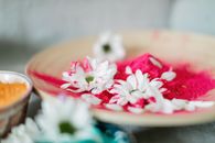 Pink and White Flowers on Brown Wooden Bowl