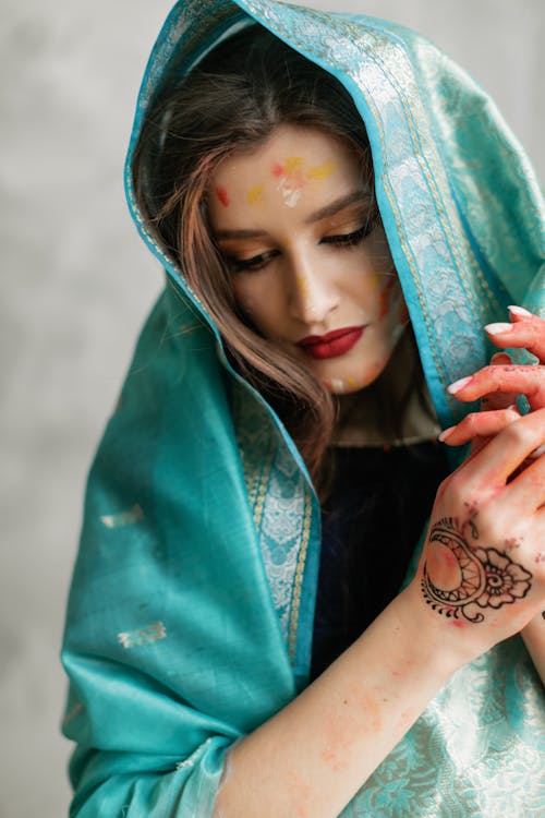 Woman Wearing Teal Shawl