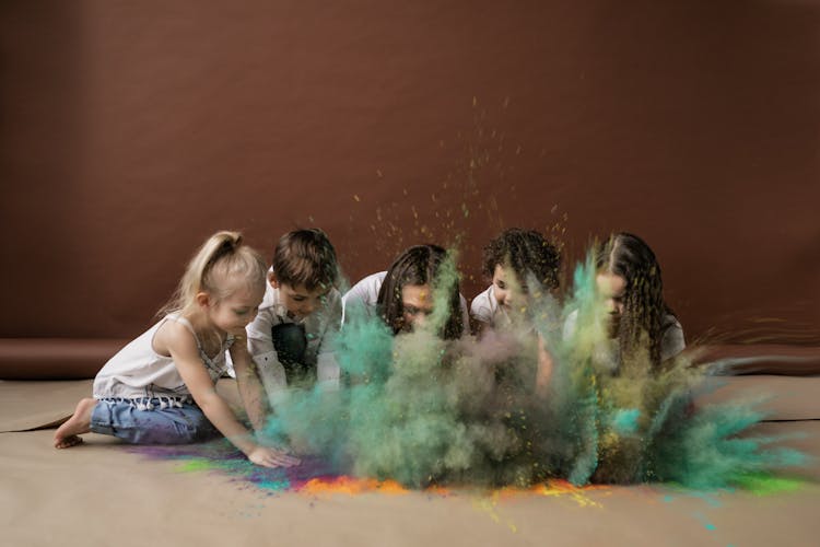 Children Playing With Holi Powder