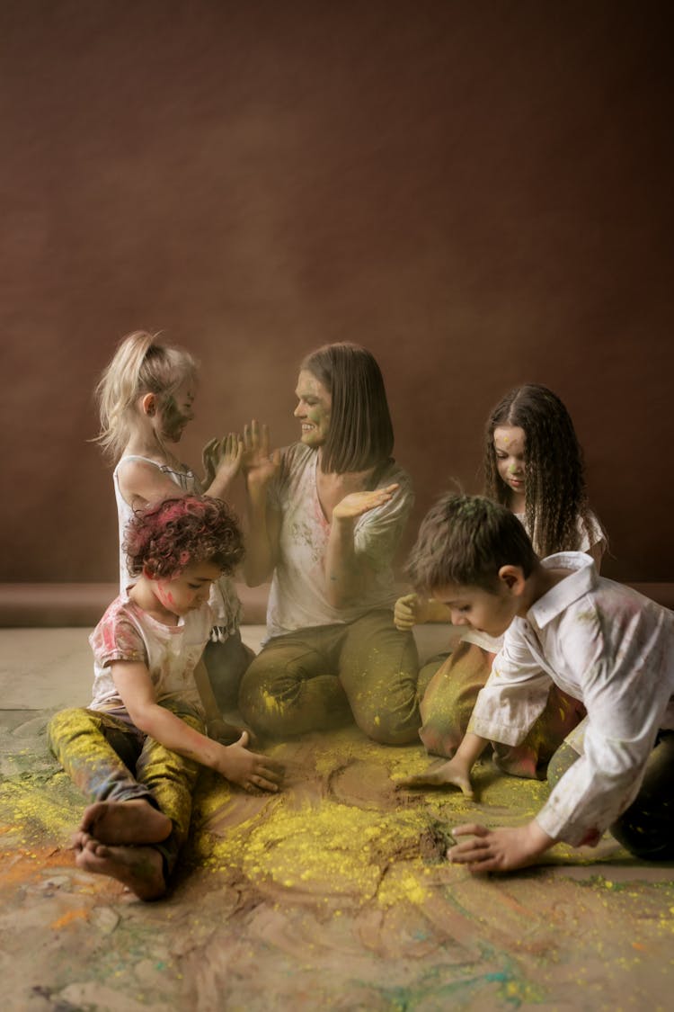 Children Playing With Holi Powder