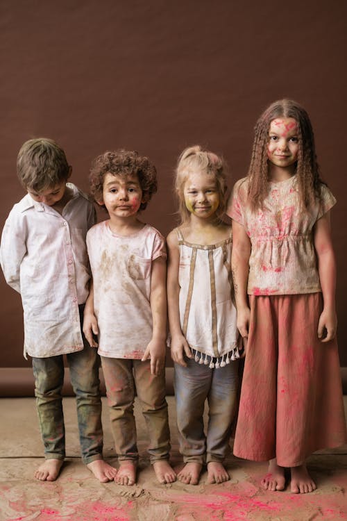 Kids Covered with Holi Powder
