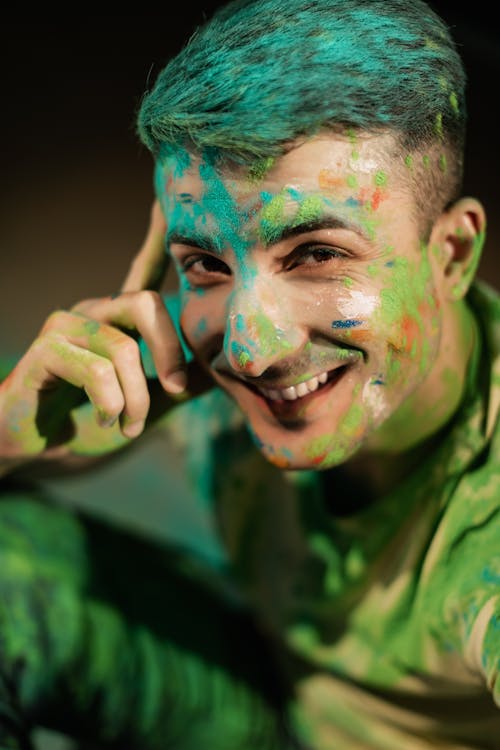 Portrait of a Man Covered in Holi Powder