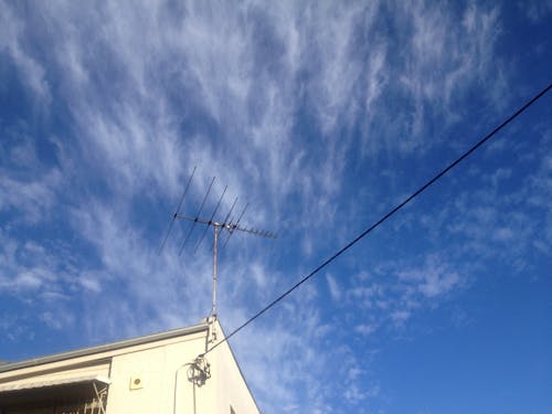 Free stock photo of blue sky, tv aerial, wire Stock Photo