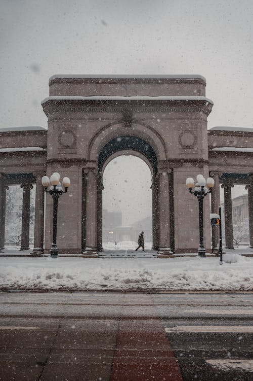 A Person Walking through the Monument During Winter Season