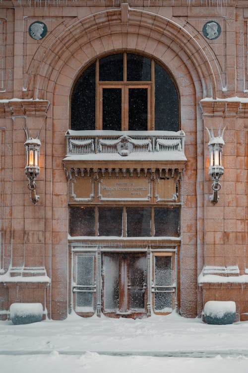 Brown Concrete Building During Winter Season