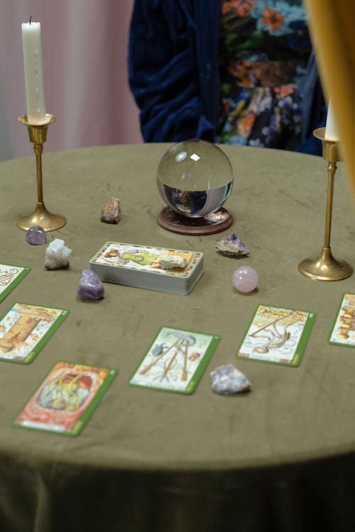 Free Tarot Cards and a Crystal Ball on the Table Stock Photo