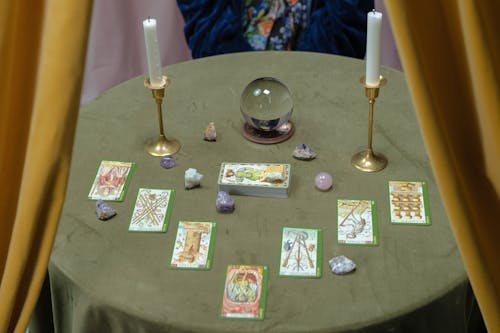 Tarot Cards and a Crystal Ball on the Table