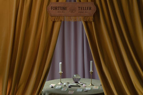 Free A Fortune Teller Booth with a Table Full of Fortune Telling Tools Stock Photo