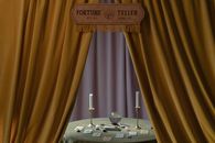 A Fortune Teller Booth with a Table Full of Fortune Telling Tools