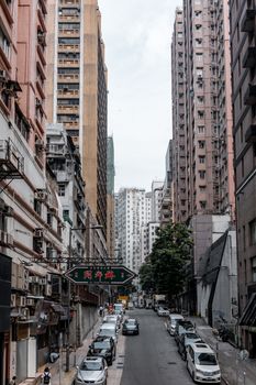 Dynamic street view surrounded by tall buildings in a bustling city landscape.