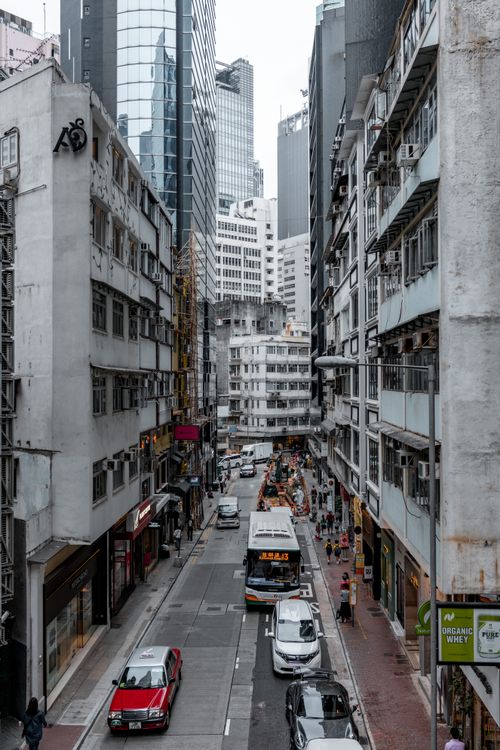 Free Busy urban street captured from a high angle. Skyscrapers and bustling street life. Stock Photo