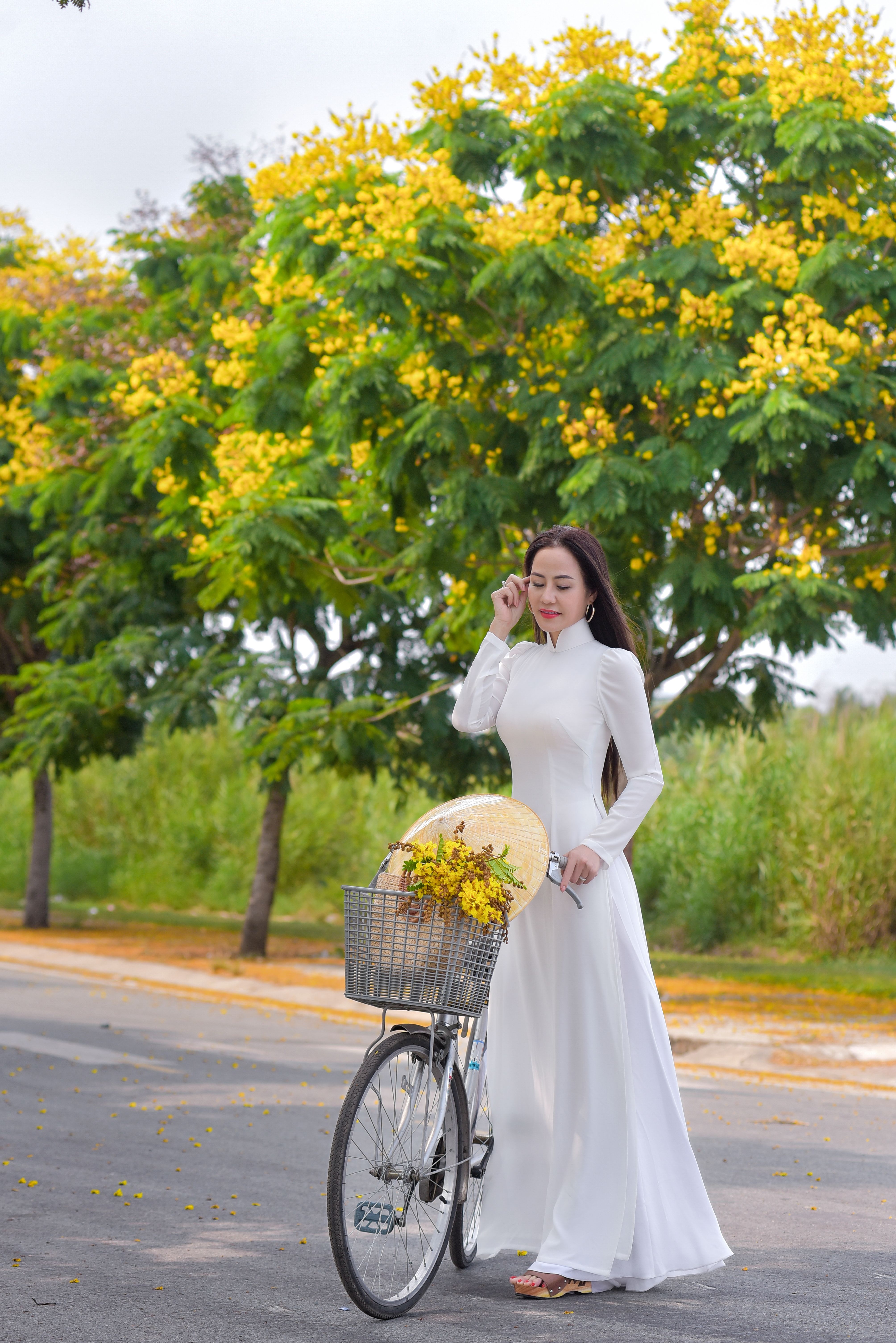 A Woman in White Long Sleeve Dress · Free Stock Photo