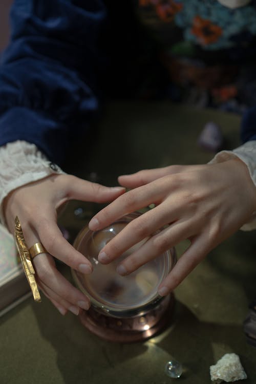 Free Hands Over Magic Crystal Ball Stock Photo