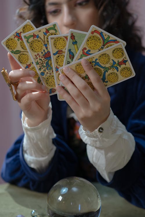Free Woman Holding Tarot Cards Stock Photo