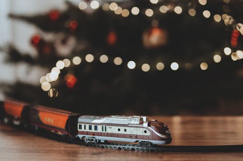 Free Shallow Focus Photography on Gray Train Plastic Toy Stock Photo