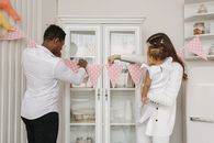 Man in White Dress Shirt Holding Girl in White Long Sleeve Shirt