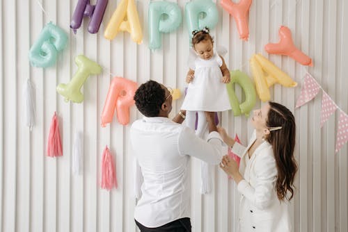 Free 
A Father Lifting His Daughter Stock Photo