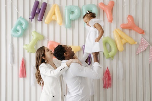 Family Celebrating the Birthday of a Young Girl