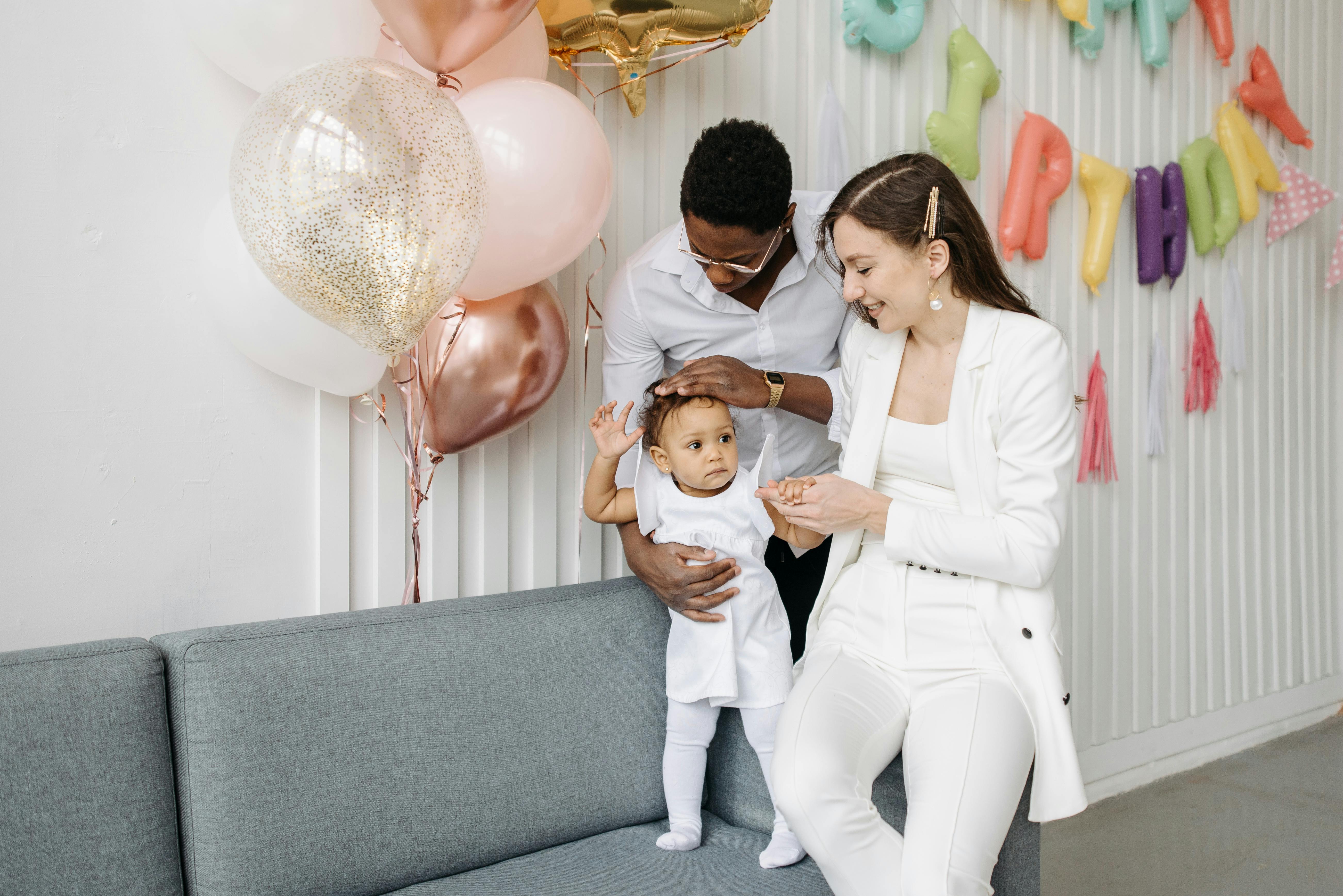 A Family Sitting On The Couch Free Stock Photo   Pexels Photo 7180243 