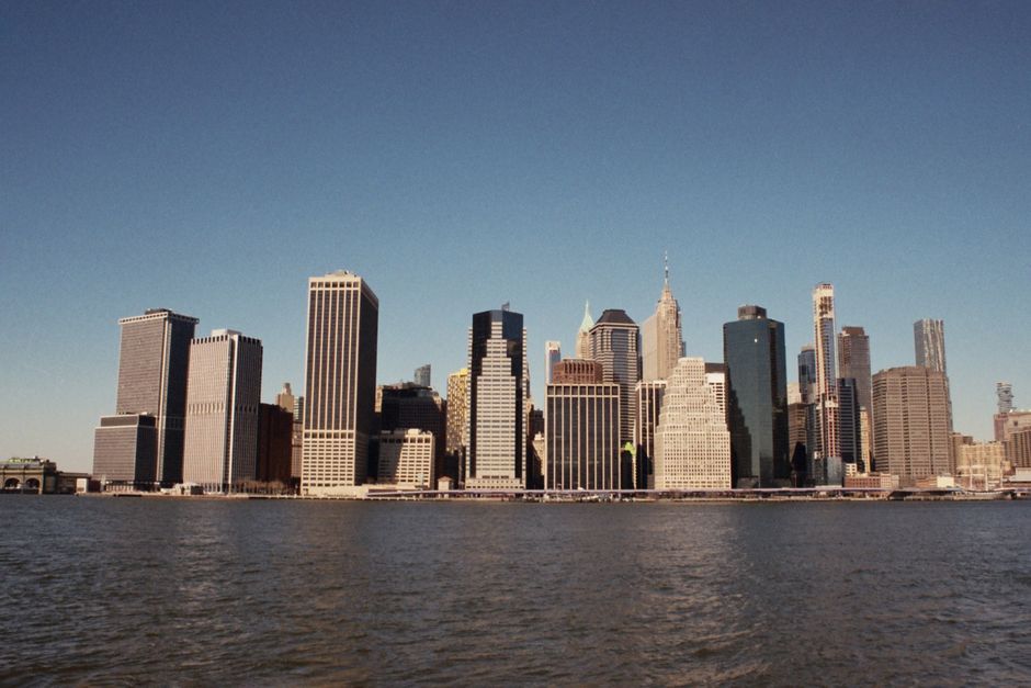 Breathtaking view of New York City's skyline with towering skyscrapers against a clear blue sky.