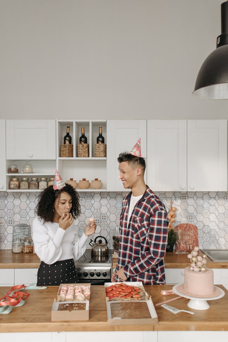 Woman In White Long Sleeve With Man In Checkered Long Sleeve Loves Eating Desserts