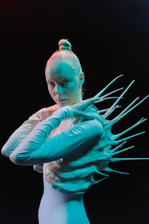 Woman Wearing a Spiky Costume Looking at Camera