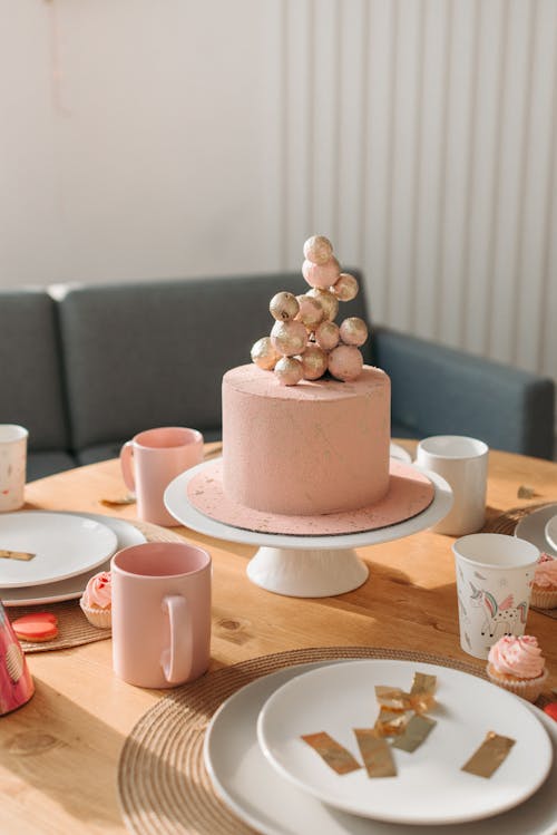 Wooden Table Prepared for a Birthday Party