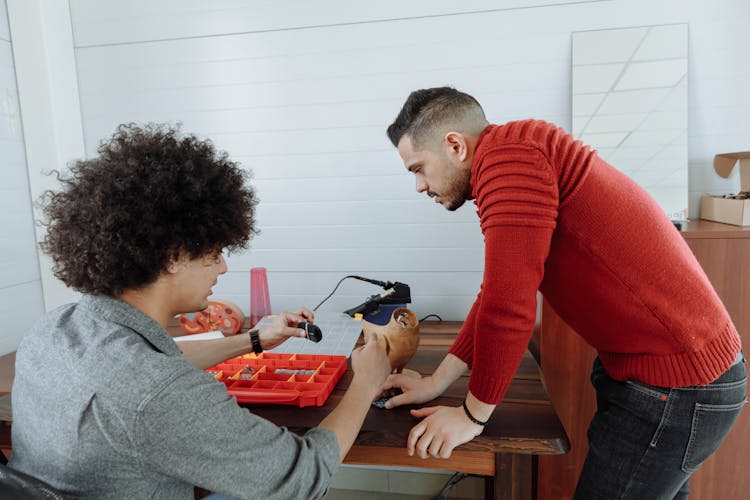 Men Working On Craft Product