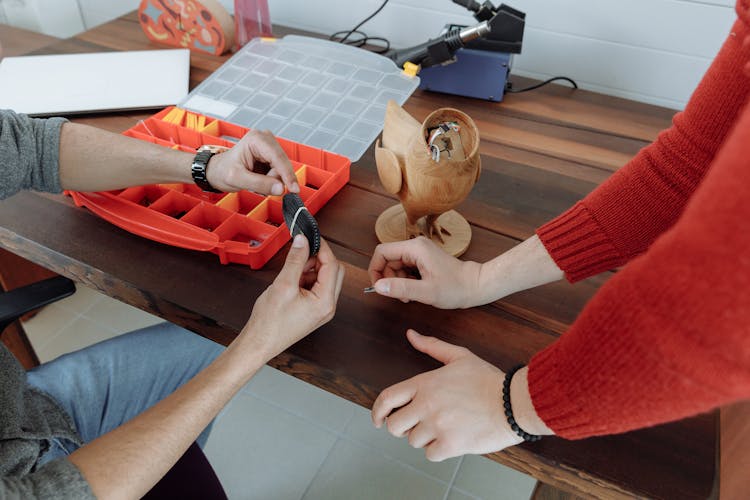 Men Working On Craft Product