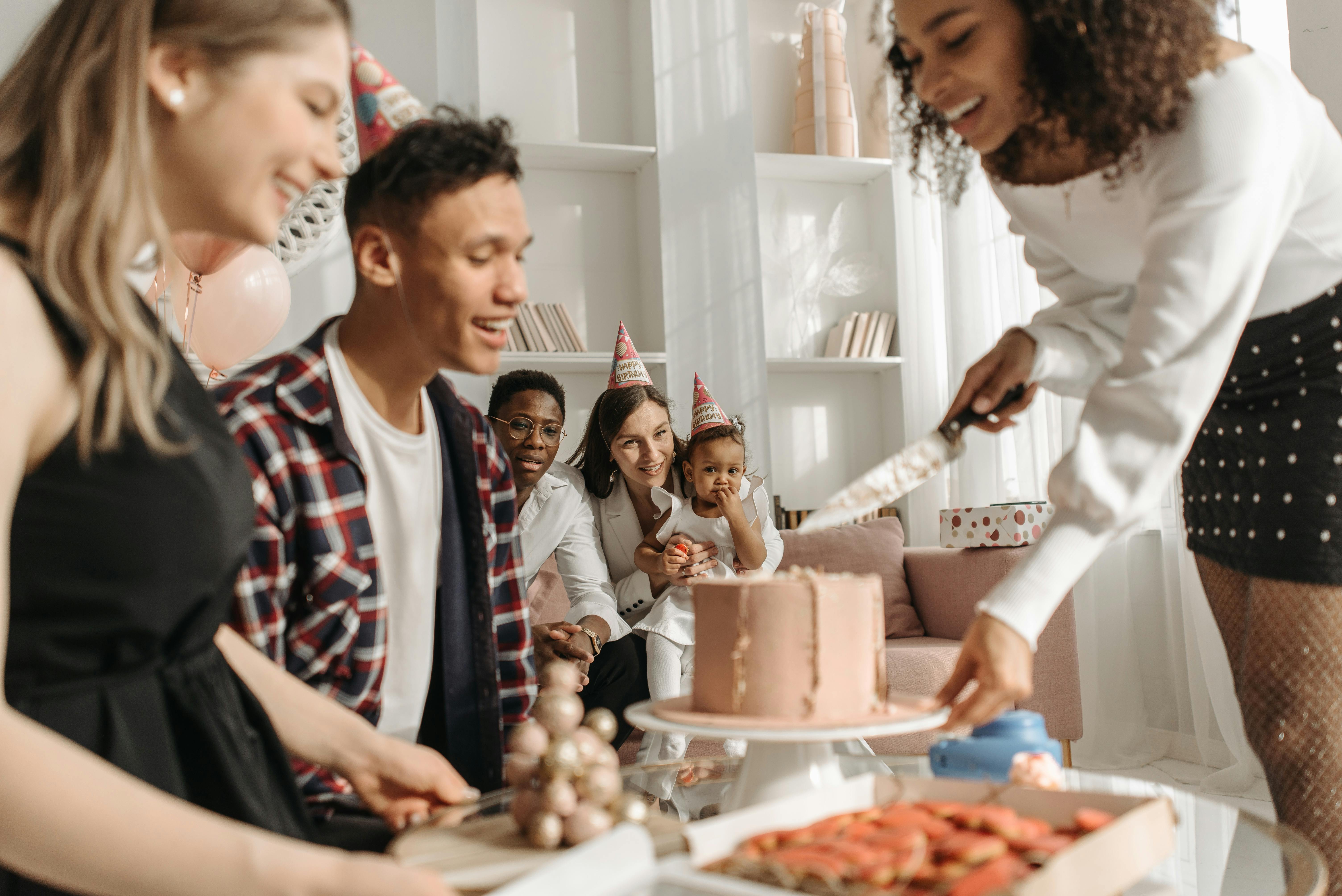 A Family Sitting On The Couch Free Stock Photo   Pexels Photo 7180861 