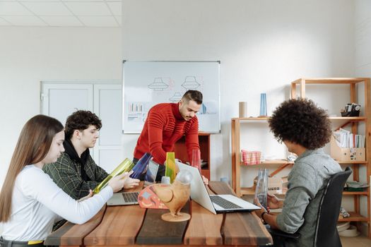 A diverse team brainstorming in a modern office, focusing on creativity and collaboration.