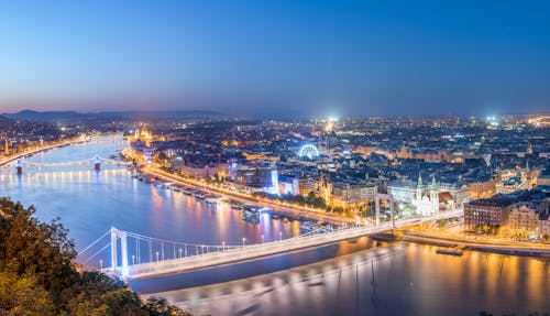 Illuminated City at Night by the Big River