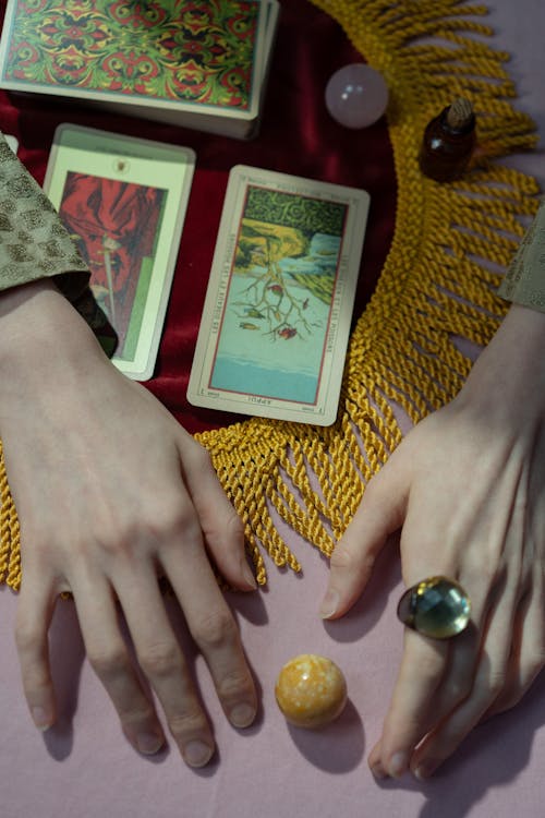 Free A Woman Holding Tarot Cards Stock Photo