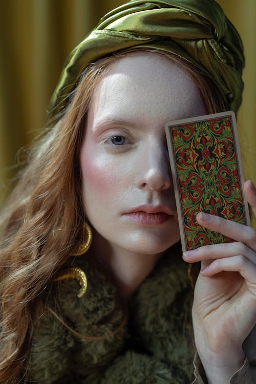 A Woman Holding a Card
