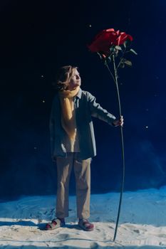 Woman in Black Blazer and Black Pants Standing on Blue Water