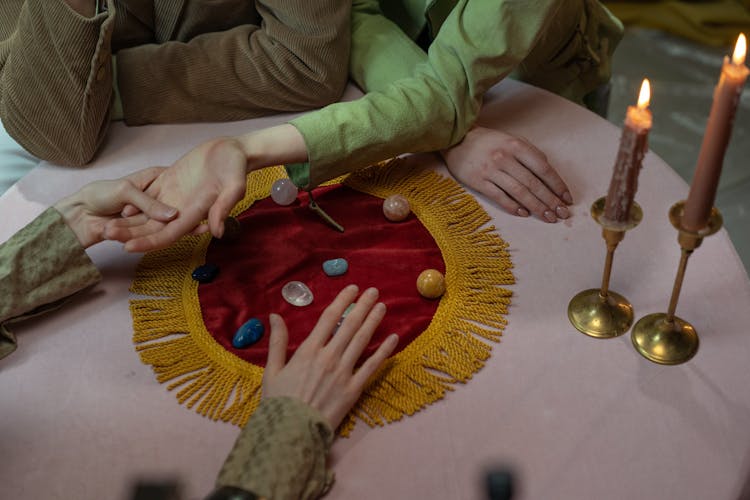 A Fortune Teller Reading A Person's Hand