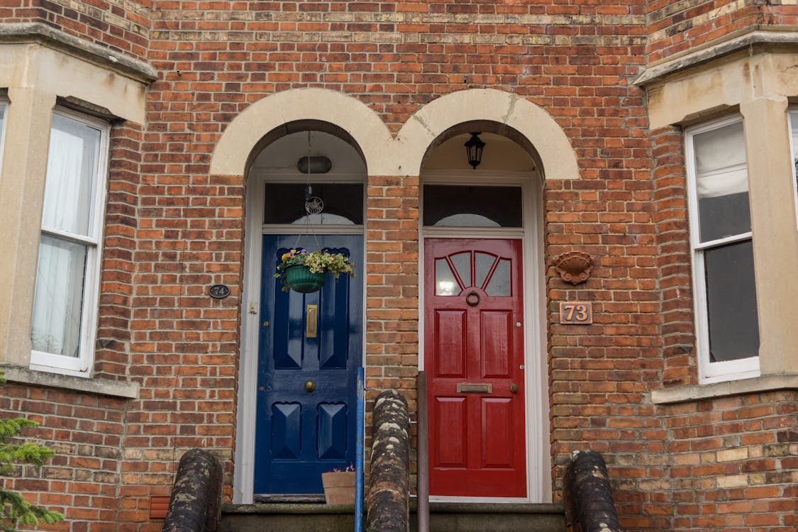 Free stock photo of blue, brick wall, doors Stock Photo